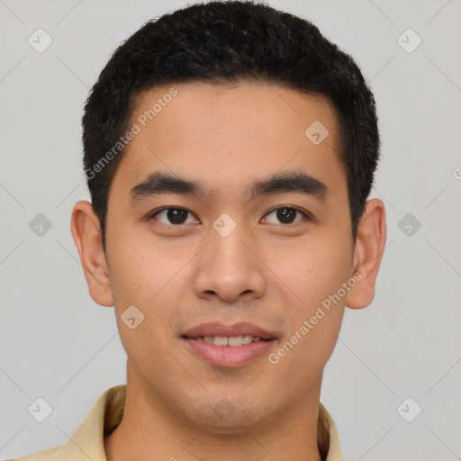 Joyful latino young-adult male with short  brown hair and brown eyes