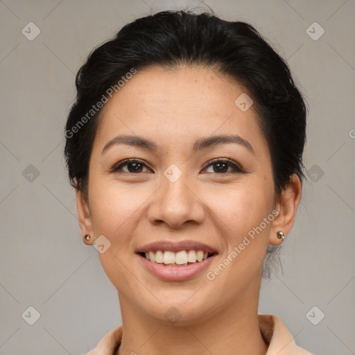 Joyful asian young-adult female with short  brown hair and brown eyes