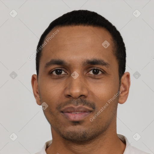 Neutral black young-adult male with short  black hair and brown eyes