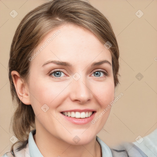 Joyful white young-adult female with medium  brown hair and blue eyes