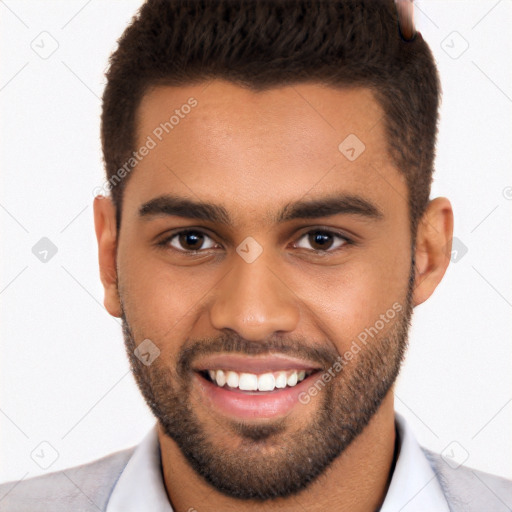 Joyful white young-adult male with short  brown hair and brown eyes