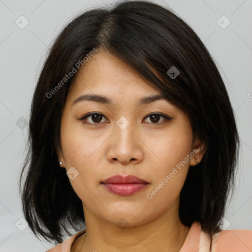 Neutral asian young-adult female with medium  brown hair and brown eyes