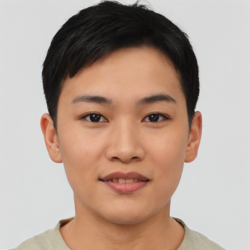Joyful asian young-adult female with short  black hair and brown eyes