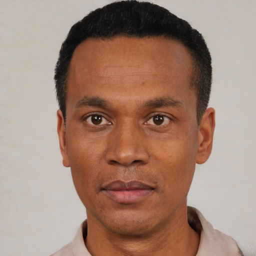 Neutral black adult male with short  black hair and brown eyes