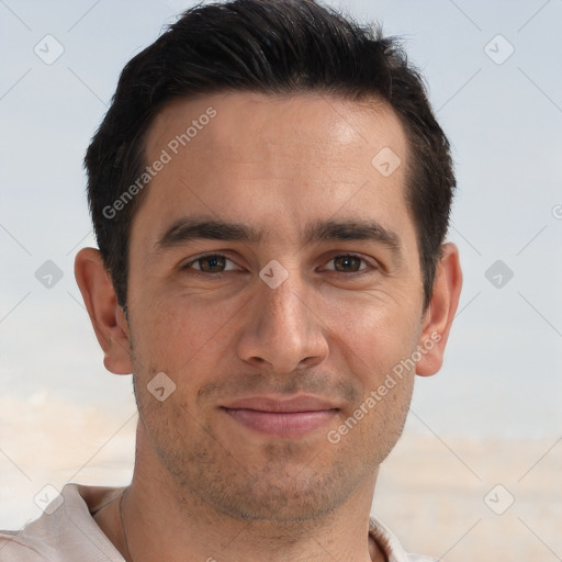 Joyful white young-adult male with short  brown hair and brown eyes