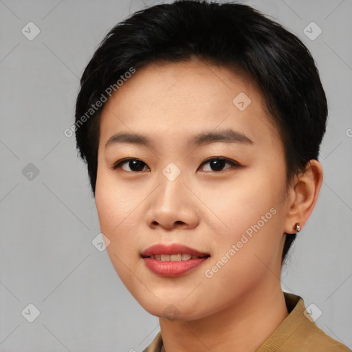 Joyful asian young-adult female with short  black hair and brown eyes