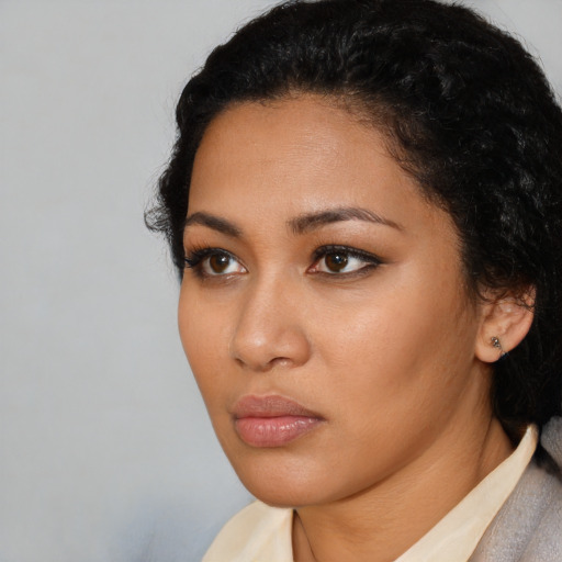 Neutral latino young-adult female with short  black hair and brown eyes