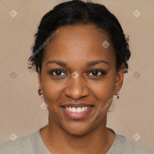 Joyful black young-adult female with short  black hair and brown eyes