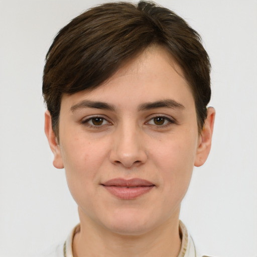 Joyful white young-adult female with short  brown hair and brown eyes