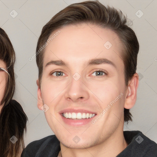 Joyful white young-adult male with medium  brown hair and brown eyes