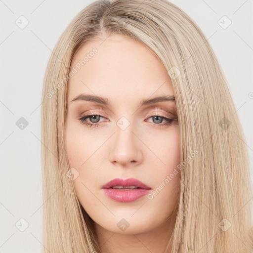 Neutral white young-adult female with long  brown hair and brown eyes