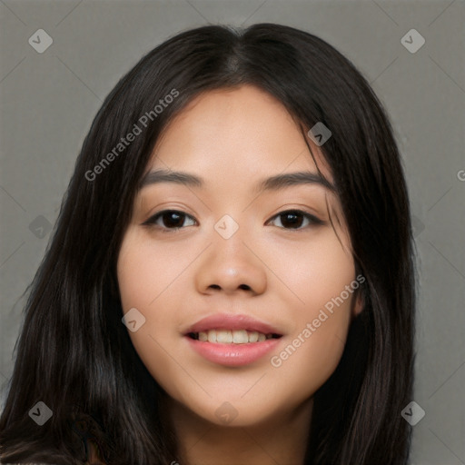 Joyful white young-adult female with long  black hair and brown eyes