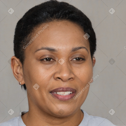 Joyful latino adult female with short  brown hair and brown eyes