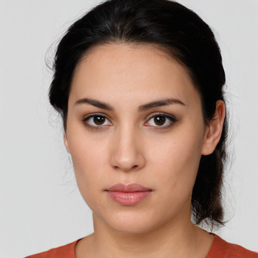 Neutral white young-adult female with medium  black hair and brown eyes