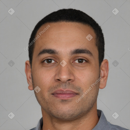 Neutral latino young-adult male with short  brown hair and brown eyes