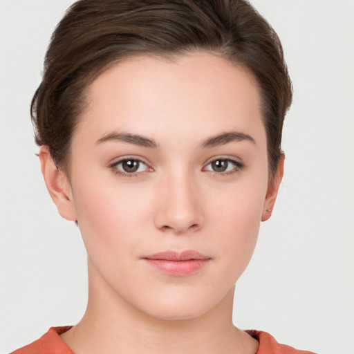 Neutral white young-adult female with short  brown hair and brown eyes