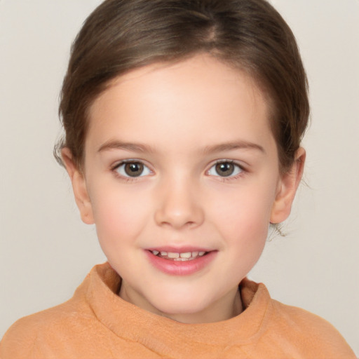 Joyful white child female with medium  brown hair and brown eyes