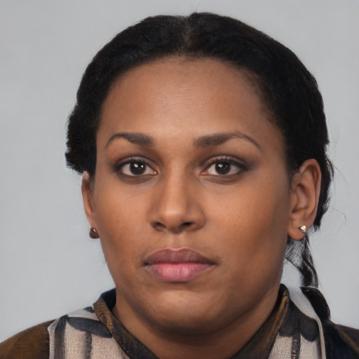 Neutral latino young-adult female with short  black hair and brown eyes
