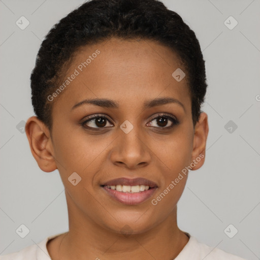 Joyful black young-adult female with short  brown hair and brown eyes