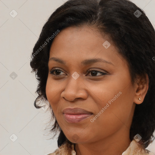 Joyful black young-adult female with medium  brown hair and brown eyes