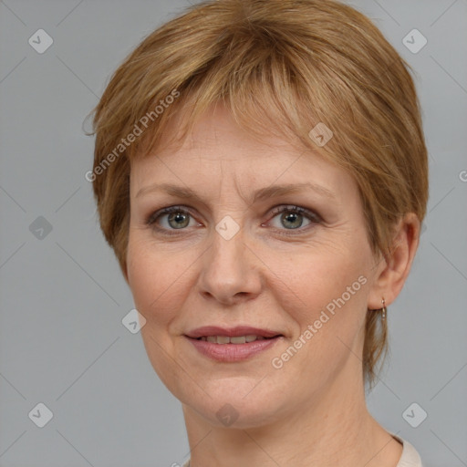 Joyful white adult female with medium  brown hair and grey eyes