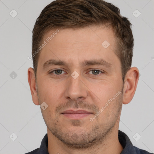 Joyful white young-adult male with short  brown hair and brown eyes