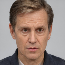 Neutral white middle-aged male with short  brown hair and brown eyes