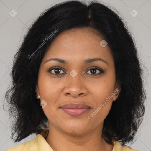 Joyful black adult female with medium  brown hair and brown eyes