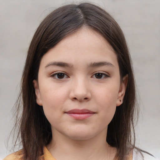 Joyful white child female with medium  brown hair and brown eyes