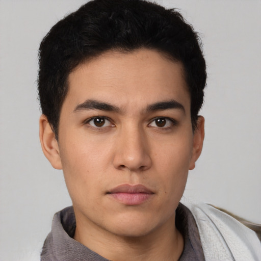 Neutral white young-adult male with short  black hair and brown eyes