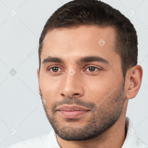 Neutral white young-adult male with short  brown hair and brown eyes