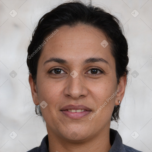 Joyful white adult female with medium  brown hair and brown eyes