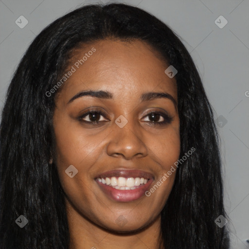 Joyful black young-adult female with long  brown hair and brown eyes