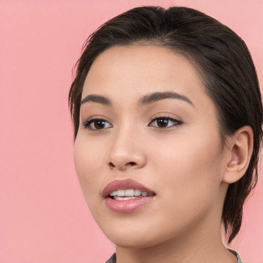 Joyful white young-adult female with medium  brown hair and brown eyes