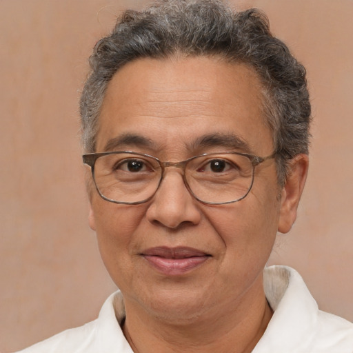 Joyful white middle-aged male with short  brown hair and brown eyes