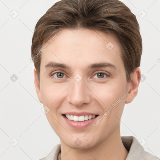 Joyful white young-adult female with short  brown hair and grey eyes