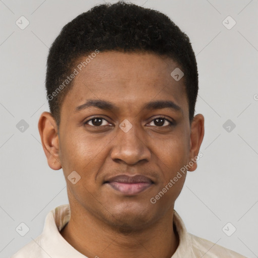 Joyful black young-adult male with short  brown hair and brown eyes