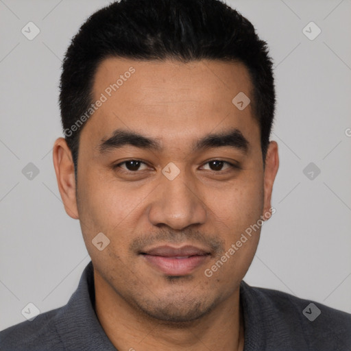 Joyful latino young-adult male with short  black hair and brown eyes