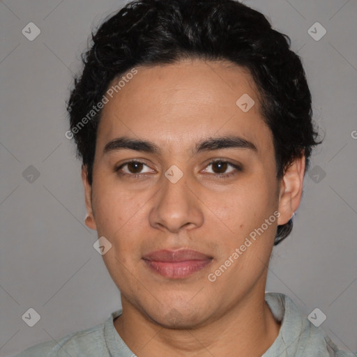 Joyful latino young-adult male with short  black hair and brown eyes