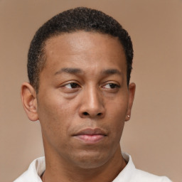 Neutral latino young-adult male with short  brown hair and brown eyes