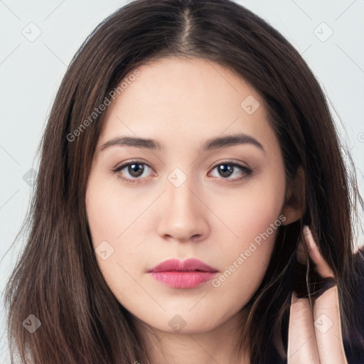 Neutral white young-adult female with long  brown hair and brown eyes