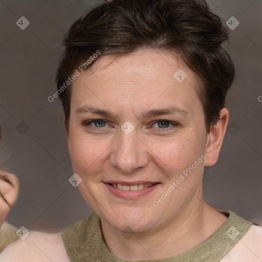 Joyful white adult female with short  brown hair and brown eyes