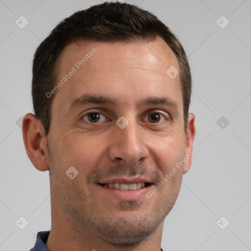 Joyful white young-adult male with short  brown hair and brown eyes