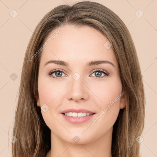 Joyful white young-adult female with long  brown hair and green eyes