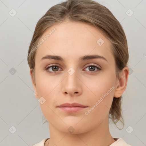 Neutral white young-adult female with medium  brown hair and brown eyes