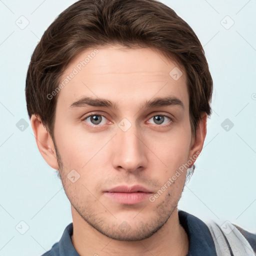 Neutral white young-adult male with short  brown hair and grey eyes