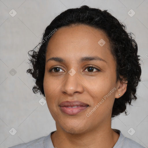 Joyful latino young-adult female with medium  black hair and brown eyes