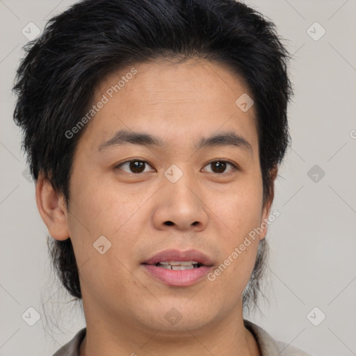 Joyful asian young-adult male with short  brown hair and brown eyes