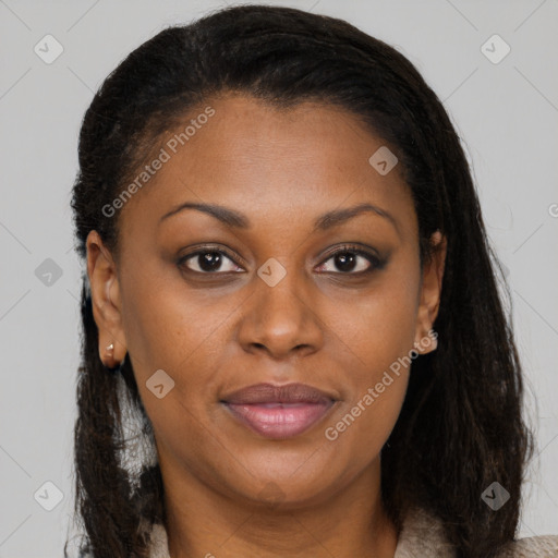 Joyful black adult female with medium  brown hair and brown eyes