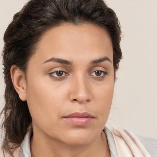 Neutral white young-adult female with medium  brown hair and brown eyes